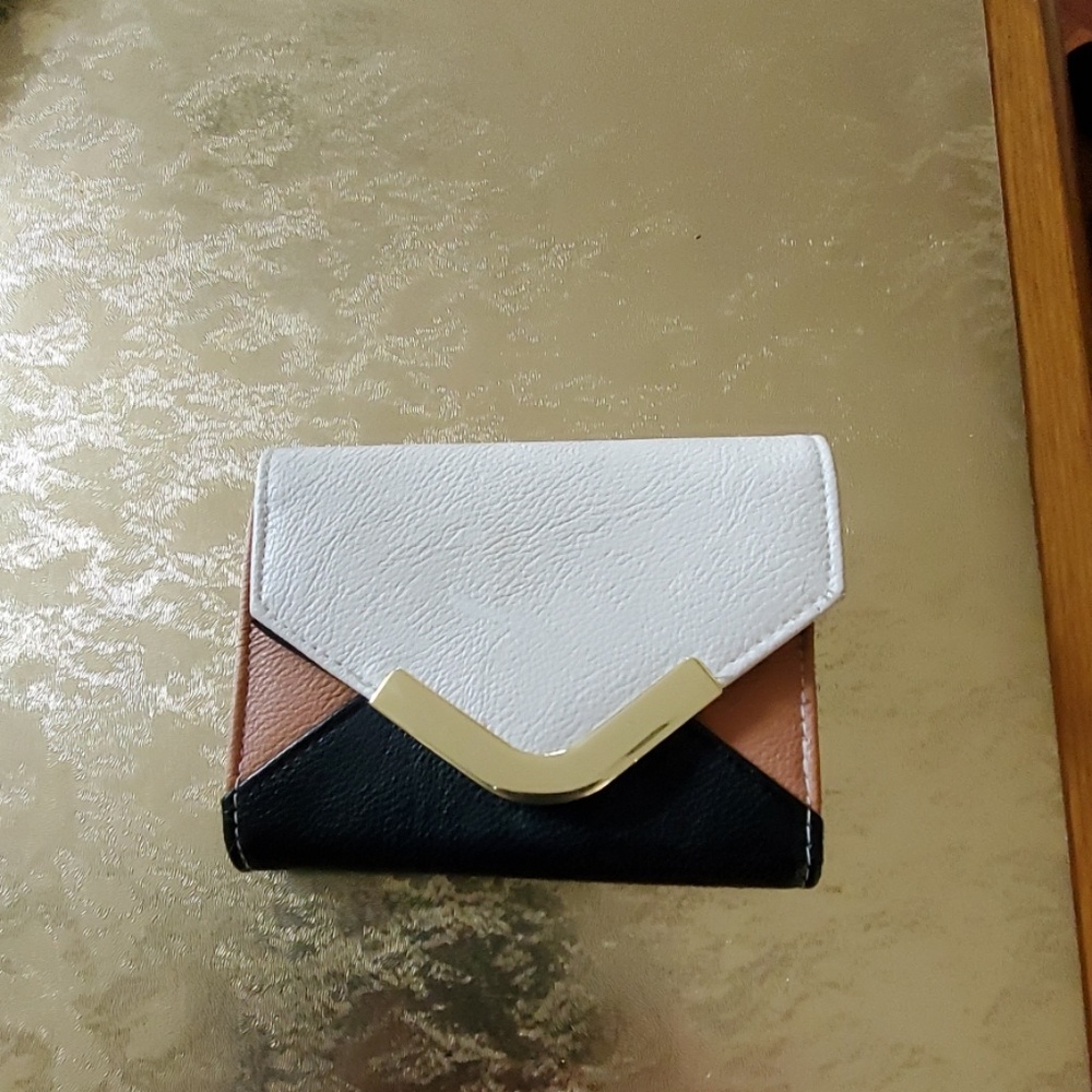 Beautiful cream, carmel and black tri fold wallet